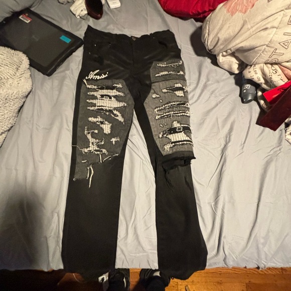 Amiri Black Jeans with Distressed Details